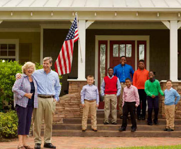Liberty Youth Ranch Image of Kids and Family in Front of House