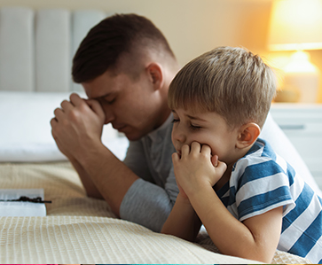 Liberty Youth Ranch - Father and son Praying
